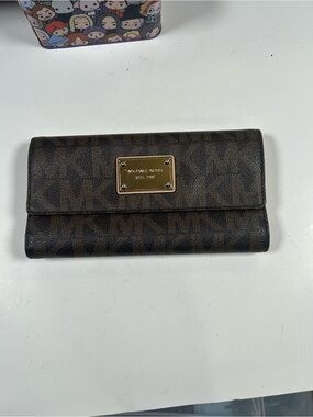 Michael Kors Brown Logo Continental Card Holder with Gold Plate